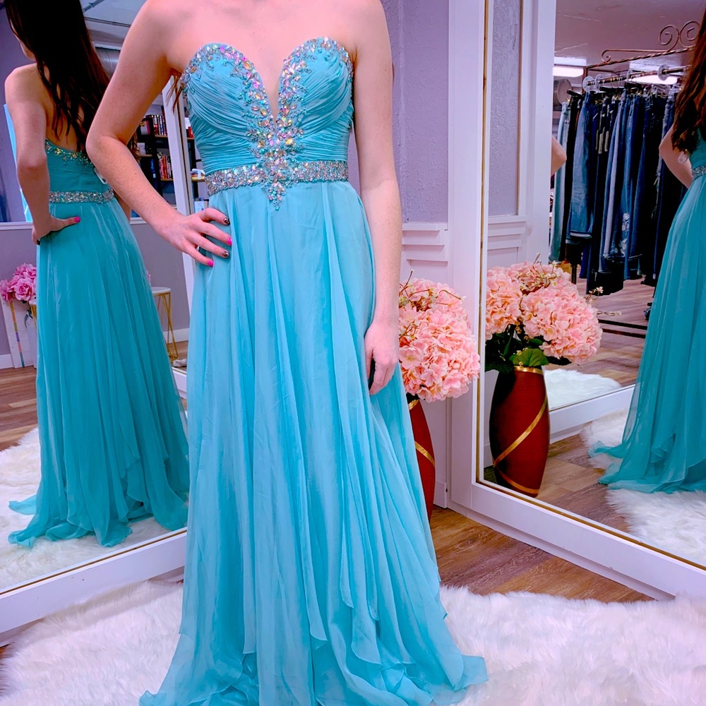 Long aqua blue prom/pageant dress.